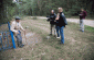 Yahad’s team with Antoni S. at the execution site.  Antoni was rerquisitionned to bury the bodies by a soltys. © Jordi Lagoutte/Yahad-In Unum