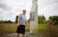 Emilia K. showing the memorial at the Jewish cemetery which was built in 18th century.  © Emmanuelle Foussat - Yahad-In Unum