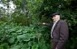 Kalikst B. pointing the place of the mass grave where 63 Jews were killed (Killing site N°3) © Rita Villanueva - Yahad-In Unum