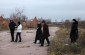 Lavrentiy G. leads a research team to the shooting site, a peat-bog at that time © David Merlin-Dufey - Yahad-In Unum