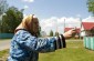 Sofia S. points out the direction from which she watched the shooting from home. ©Jethro Massey/Yahad - In Unum