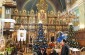 Yahad's team headed by Father Desbois during the interview. Inside the church © Erez Lichtfeld – Yahad-In Unum