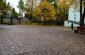 The former market square of Gargždai still has its original pavement and the stone wall of the church. ©Kate Kornberg/Yahad - In Unum