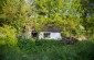 The abandoned house which used to belong to the family of Pinia. The entire family was shot dead on the spot in the vegetable garden while trying to escape. © Jordi Lagoutte/Yahad-In Unum