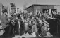 German troops with a Luftwaffe unit round up a group of elderly, religious Jews in Szczebrzeszyn.© United States Holocaust Memorial Museum, courtesy of Instytut Pamieci Narodowej