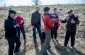 Yahad’s team with a local witness during the interview in the Grushevyi Yar© Kate Kornberg/Yahad-In Unum