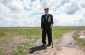 The witness shows a place where several anti-tank trenches were located. Between 5,000 and 10,000 Jews were murdered here.  © Aleksey Kasyanov/Yahad-In Unum