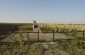 The monument to 36 Jewish refugees executed at this site. It is located on the edge of a cultivated field outside Kuzhorskaya, by the road.  © Cristian Monterroso  /Yahad-In Unum