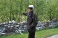 The member of the administration shows the place where the orphans and their tutors were killed by Germans. The coprses were reburied in Teberda. © Cristian Monterroso  /Yahad-In Unum