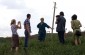 Halyna H., born in 1936, with the Yahad team at the killing site of 480 Jews in Chyzhove. ©Svitlana Kovaliova/Yahad - In Unum