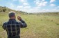 A local villager took us to the execution site along with the witness. He remembered finding bullet shells at this place when he was a kid. ©Omar Gonzalez/Yahad-In Unum