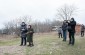 The Yahad team with Iaroslava K. at the execution site at the Jewish cemetery.  ©Les Kasyanov/Yahad - In Unum