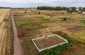 A drone view at the two mass graves located 500m from one another where 700 people, including Jews, POWs and communists, were murdered under the occupation.  ©Aleksey Kasyanv/Yahad-In Unum