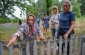 The Yahad team at the execution site with a witness and her daughter. ©Les Kasyanov/Yahad – In Unum