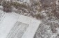 A drone view at the approximate location of a mass grave where isolated killings of Jews detained in the labor camp were conducted. ©Les