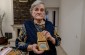 Iryna S., born in 1936, with the medal of the Righteous awarded to her mother. ©Les Kasyanov/Yahad - In Unum