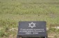The memorial erected at the anti-tank ditch outside Hvozdavka. The site marks the mass grave of several thousand Jews who died of starvation and disease in the transit camp or were murdered on site. ©Svitlana Kovaliova/ Yahad - In Unum